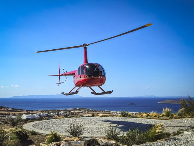 Helicopter landing at the estate's helipad