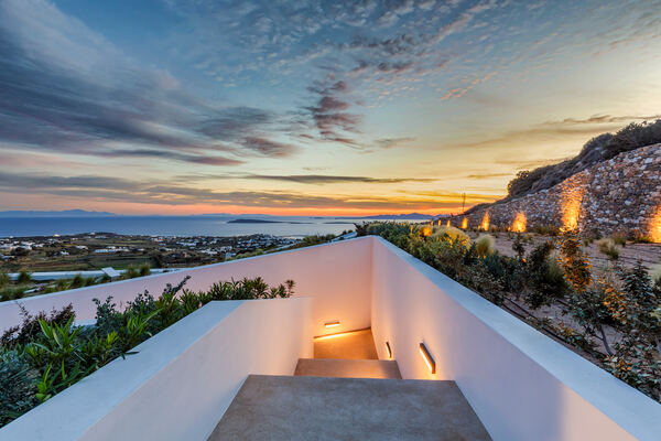 Sunken outdoor lounge area at dusk
