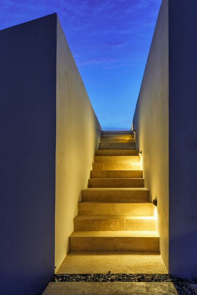 Softly lit interior stairway corridor