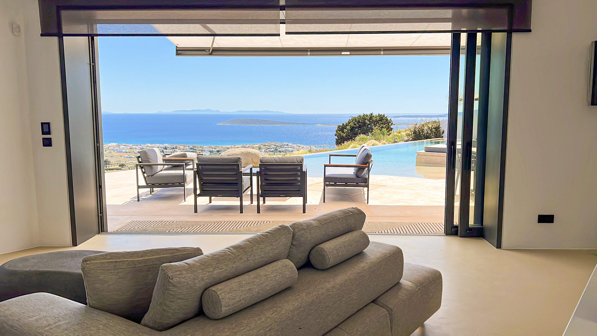 Living room opening onto the pool terrace