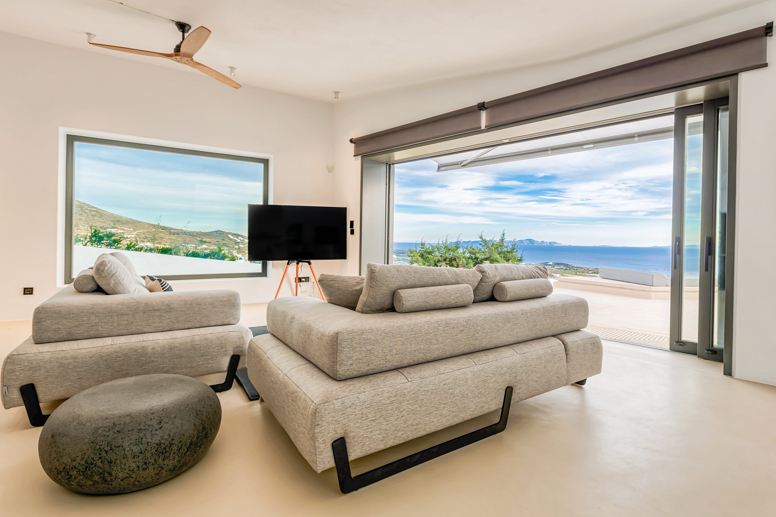 Living room opening onto the pool terrace