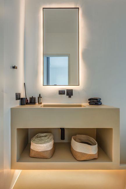 Bathroom vanity with backlit mirror